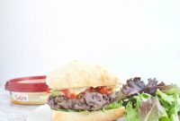 Hummus-Stuffed Black Bean Burgers with Lemon Tahini Sauce