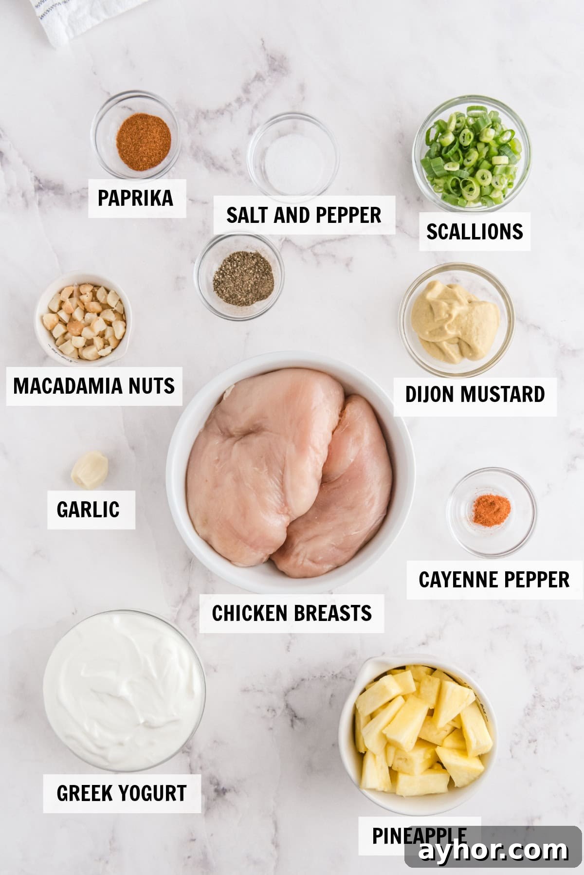 ingredients for hawaiian chicken salad on a white countertop