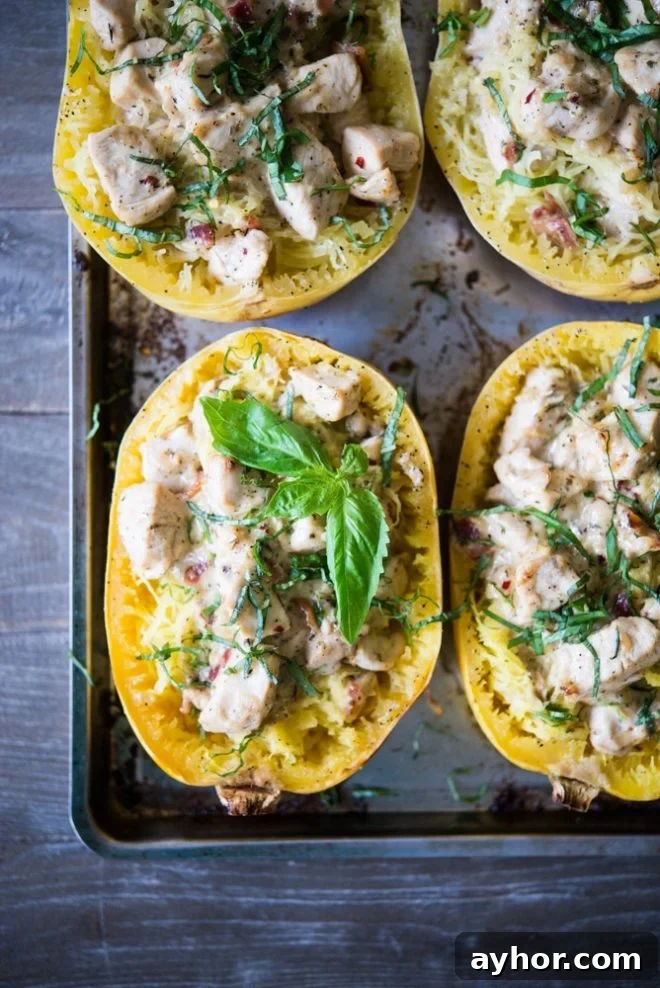 Creamy Chicken Stuffed Spaghetti Squash Boats for Weeknight Dinner 2 creamy chicken bacon spaghetti squash boats