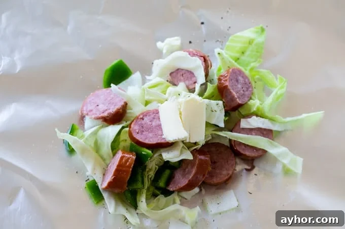 Keto Sausage and Cabbage Foil Packets for Quick Low-Carb Meals 4 place ingredients on foil