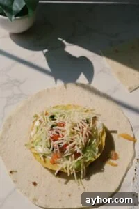 Vegetarian Crunchwrap Supreme Recipe: How to Make It at Home 15 adding toppings