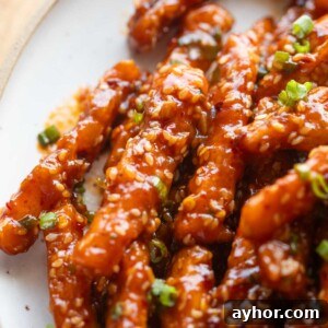 Crispy Honey-Chili Potatoes Recipe — Sweet Spicy Fried Potatoes 5 close up image of crispy honey chilli potatoes to showcase their texture