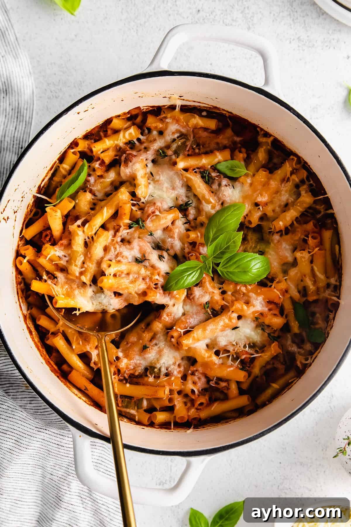 Baked ziti plated in a bowl. 