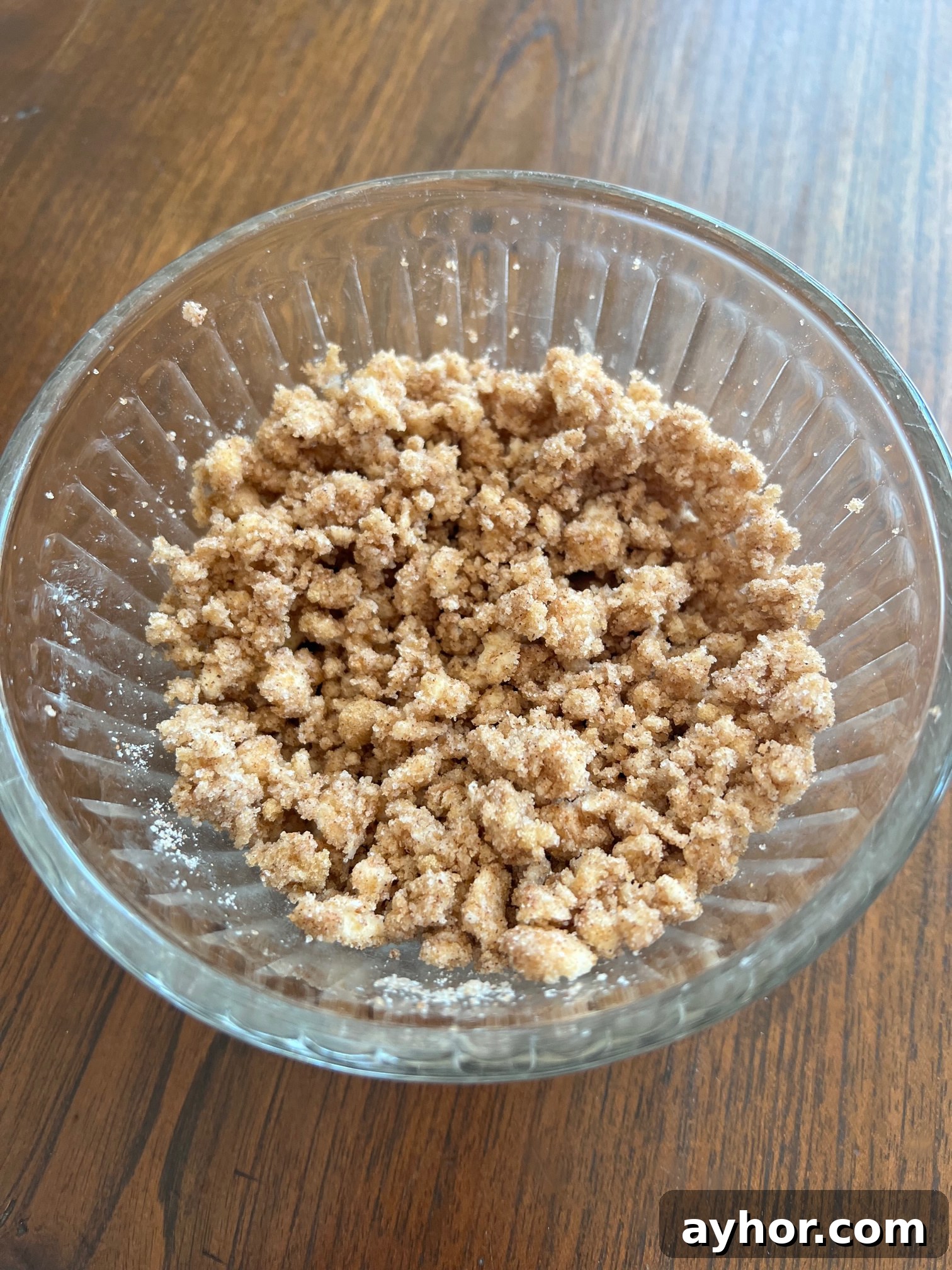 This is a photo of the butter, sugars and pumpkin pie spice after cutting in, ready to be used in the recipe. 