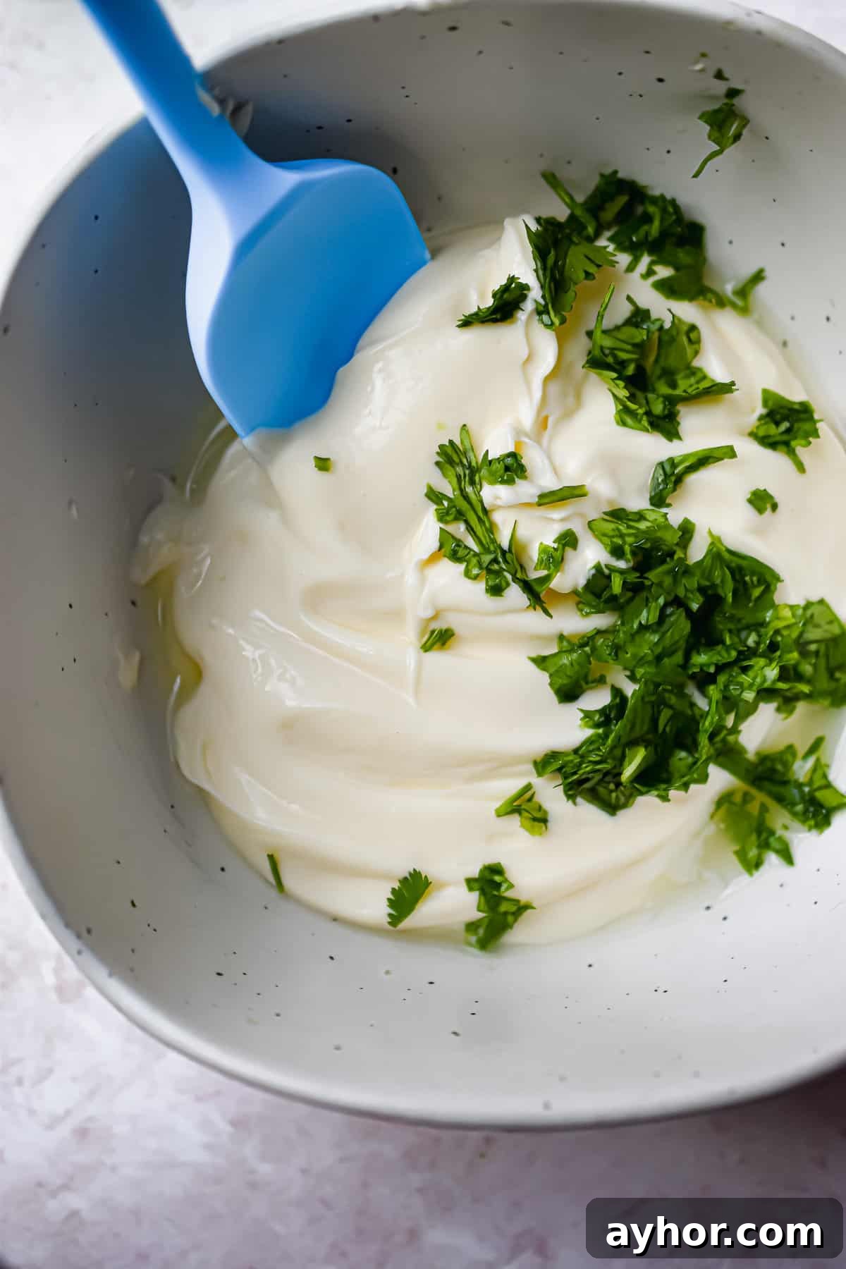 Cilantro is added to the lime aioli