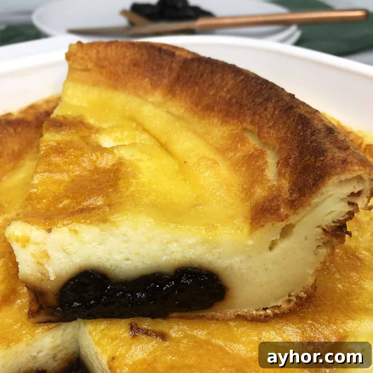 A slice of Far Breton on top of the prune custard.