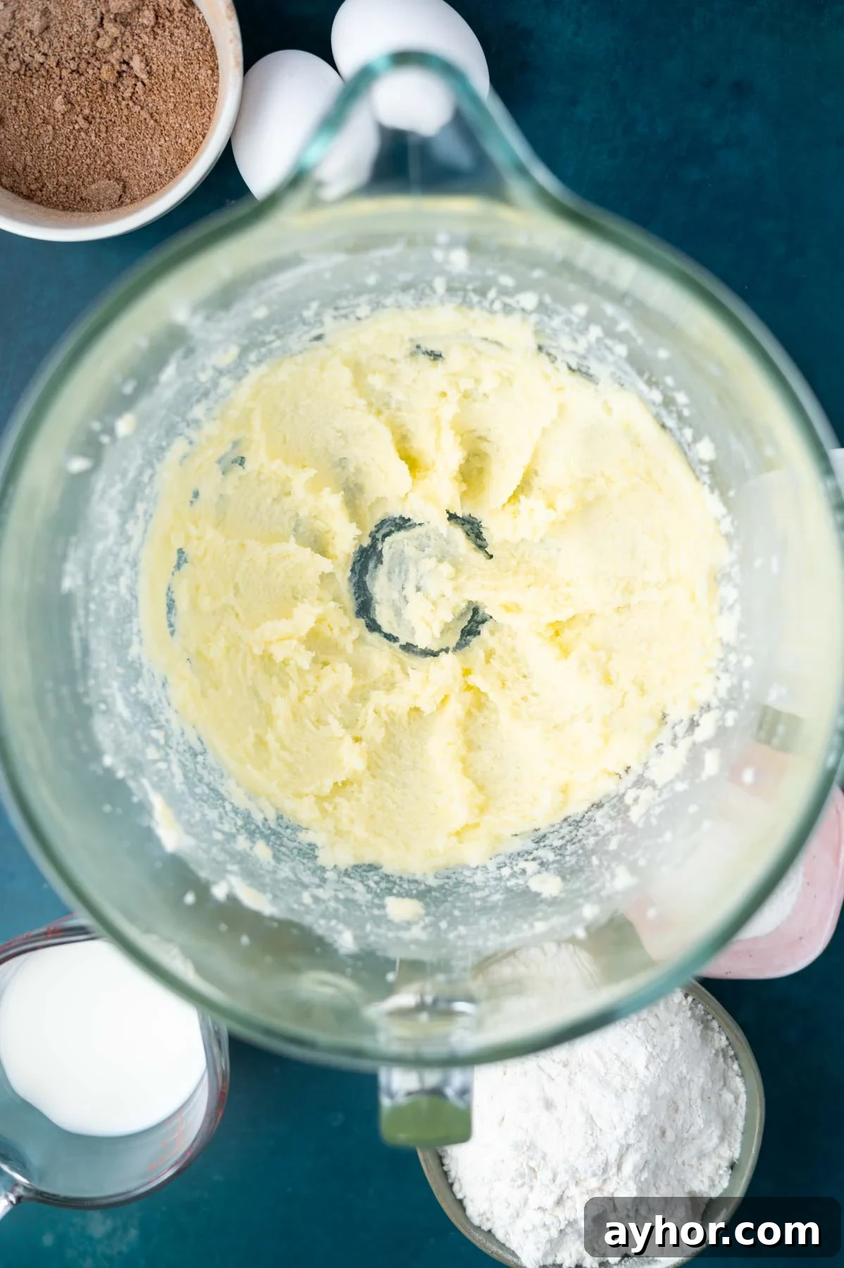 butter and sugar creamed together in a mixing bowl