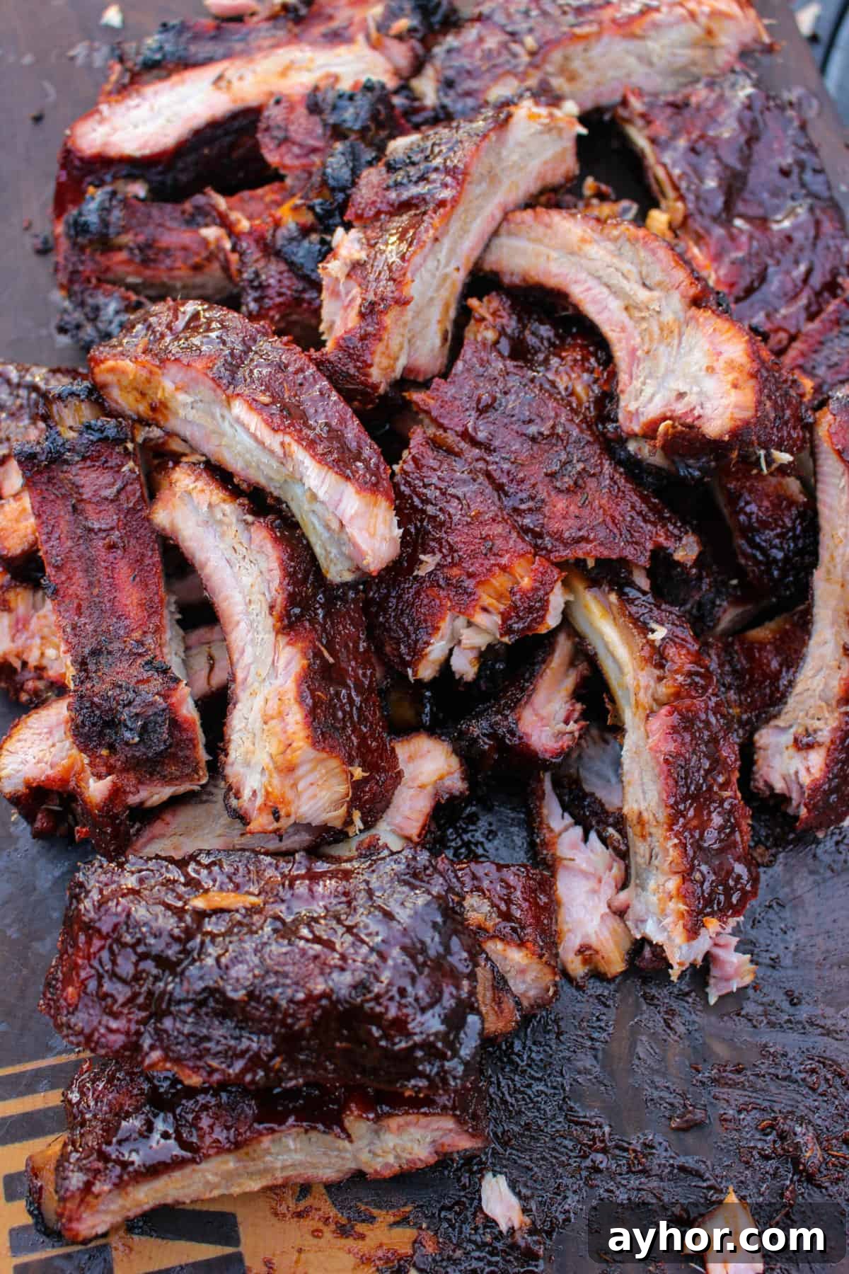 Maple-Cajun Smoked Ribs Recipe for Tender, Flavorful BBQ 5 Maple Cajun Smoked Ribs sliced and served.