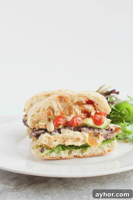 Hummus-Stuffed Black Bean Burgers with Lemon Tahini Sauce 2 Hummus Stuffed Burger