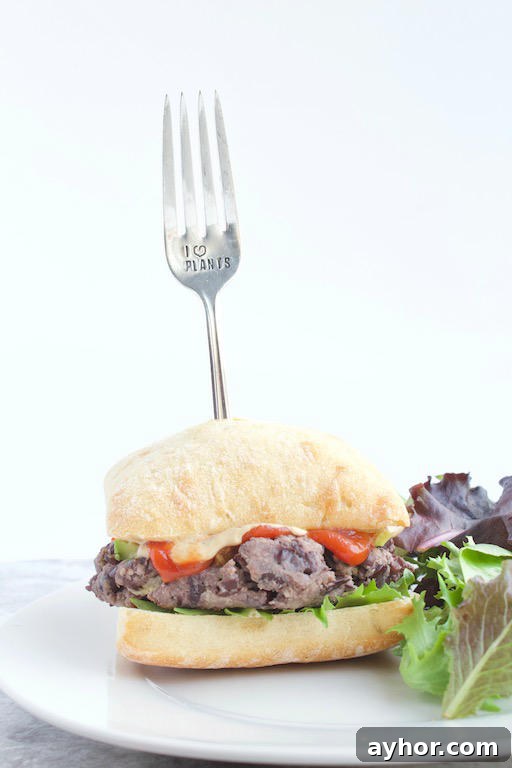Hummus-Stuffed Black Bean Burgers with Lemon Tahini Sauce 3 Hummus Stuffed Burger