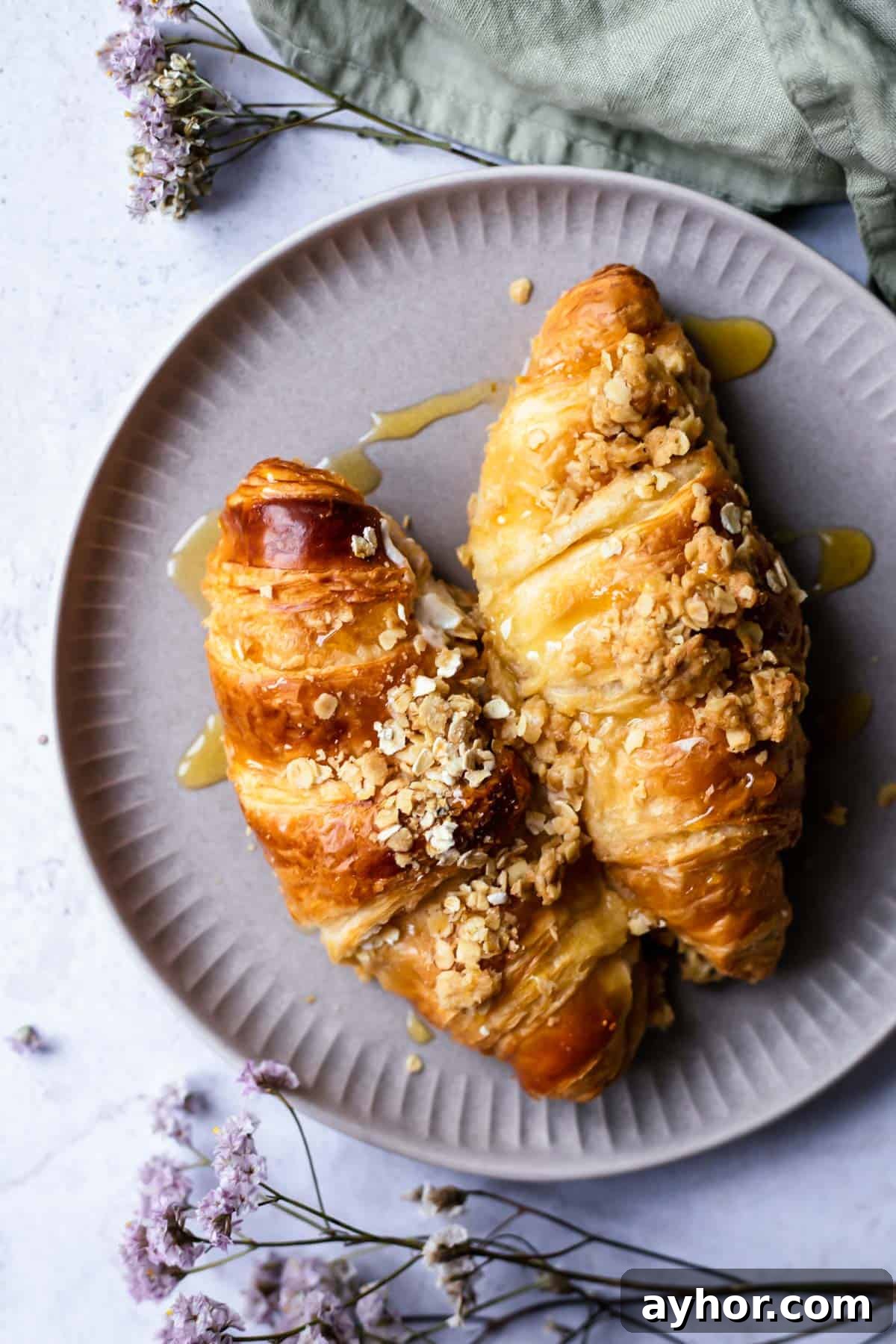 Cinnamon Apple French Toast Bake with Crisp Topping 9 two cinnamon crisp apple french toast bake croissants on a plate