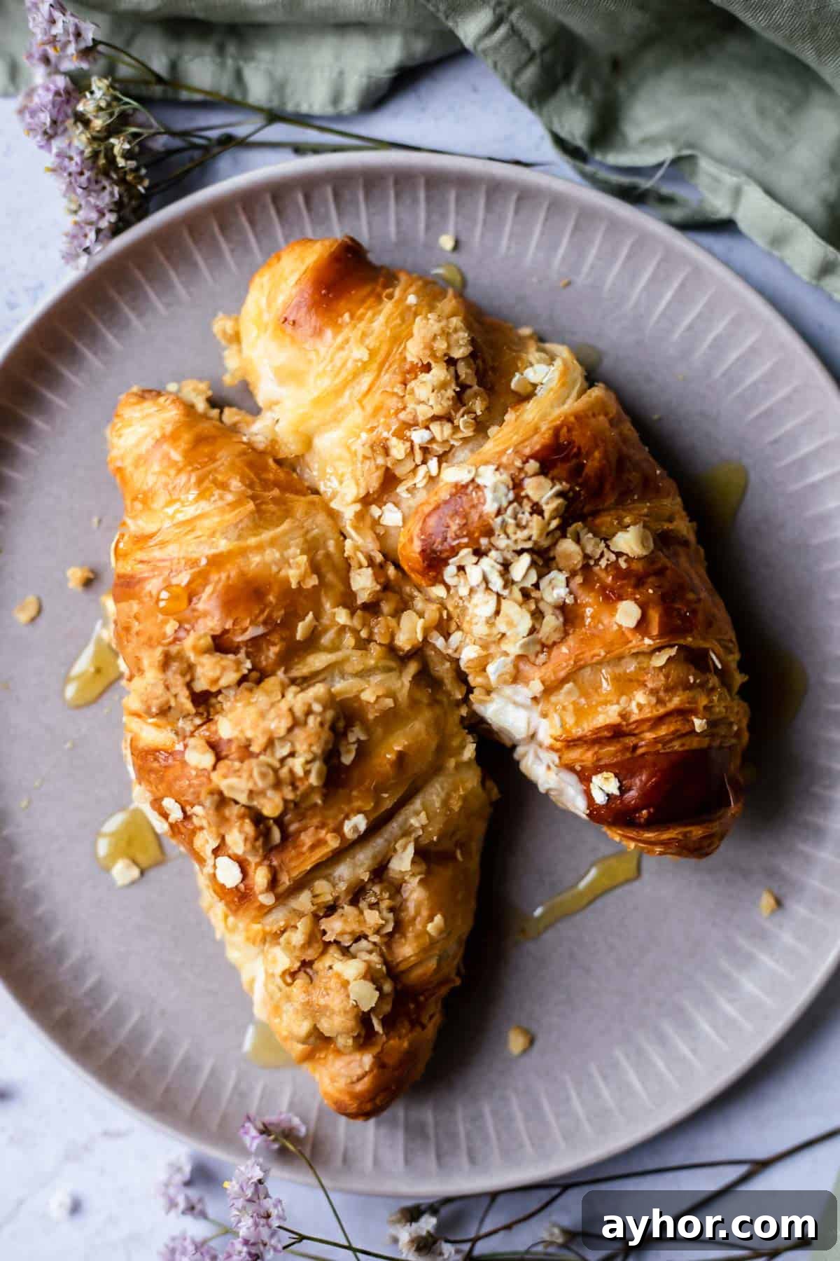 Cinnamon Apple French Toast Bake with Crisp Topping 10 two cinnamon crisp apple french toast bake croissants on a plate