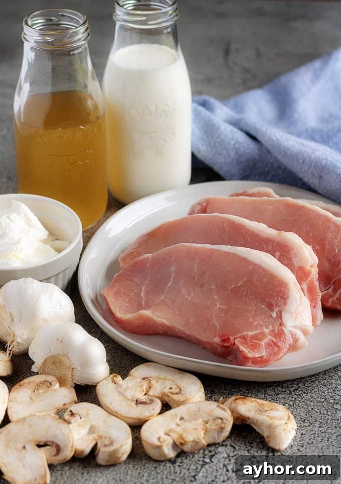 Instant Pot Pork Chops in Creamy Mushroom Gravy 3 A photo of the Instant Pot pork chops ingredients like, fresh mushrooms, garlic, chicken broth, and sour cream.
