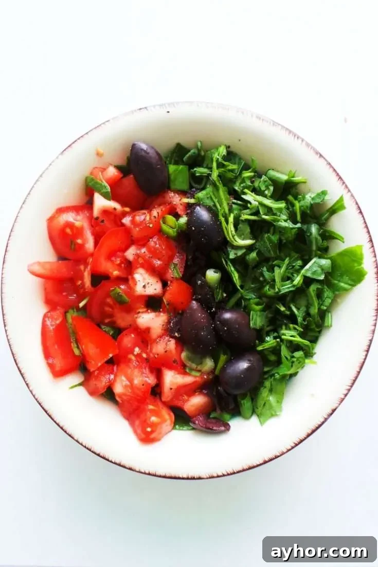 Simple tomato salad recipe! This healthy tomato recipe is delicious, easy and very refreshing. This simple healthy salad is a perfect side dish for summer!