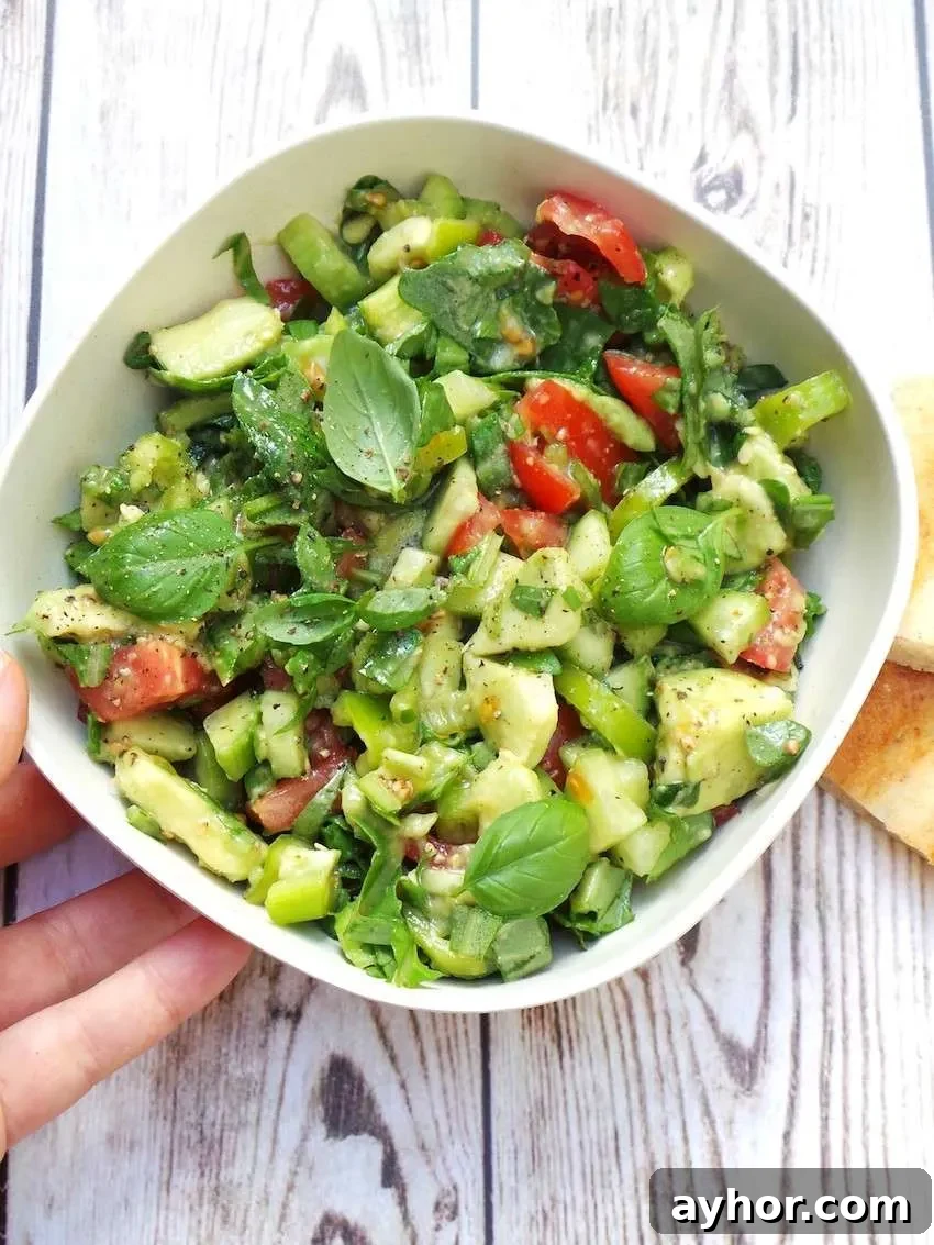 Tasty and healthy tomato avocado and arugula salad!