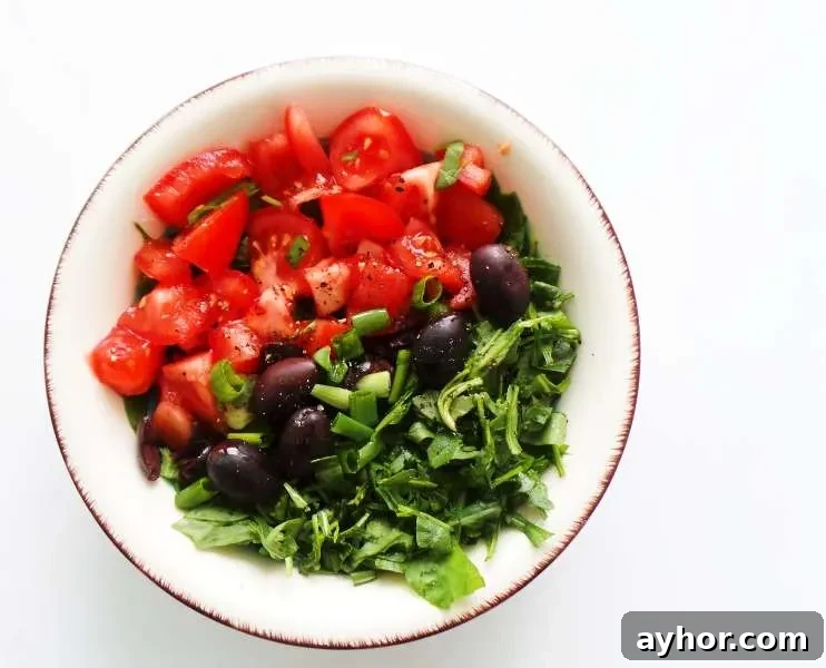 Simple tomato salad recipe! This healthy tomato recipe is delicious, easy and very refreshing. This simple healthy salad is a perfect side dish for summer!