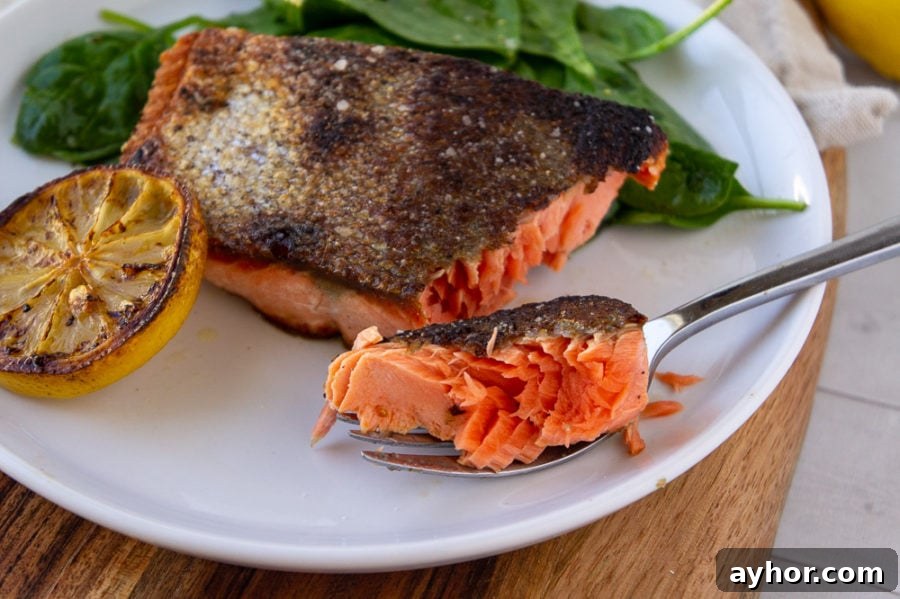 Pan-Seared Salmon in a Cast-Iron Skillet: Crispy Skin, Tender Flesh 2 A crisp skinned salmon filet cooked to medium
