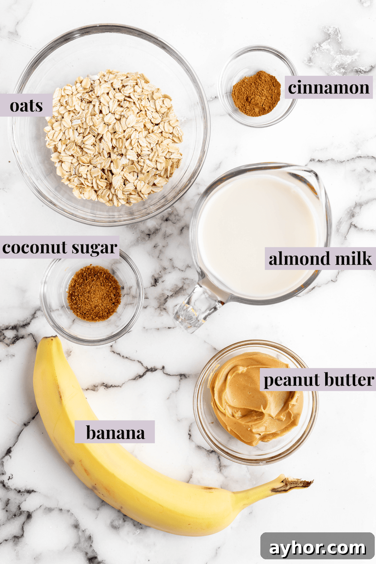 Overhead view of peanut butter banana overnight oats ingredients with labels