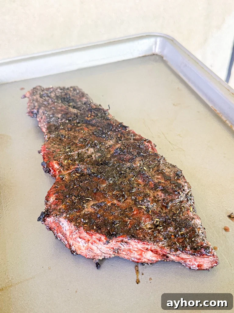 resting skirt steak for chimichurri loaded steak fries
