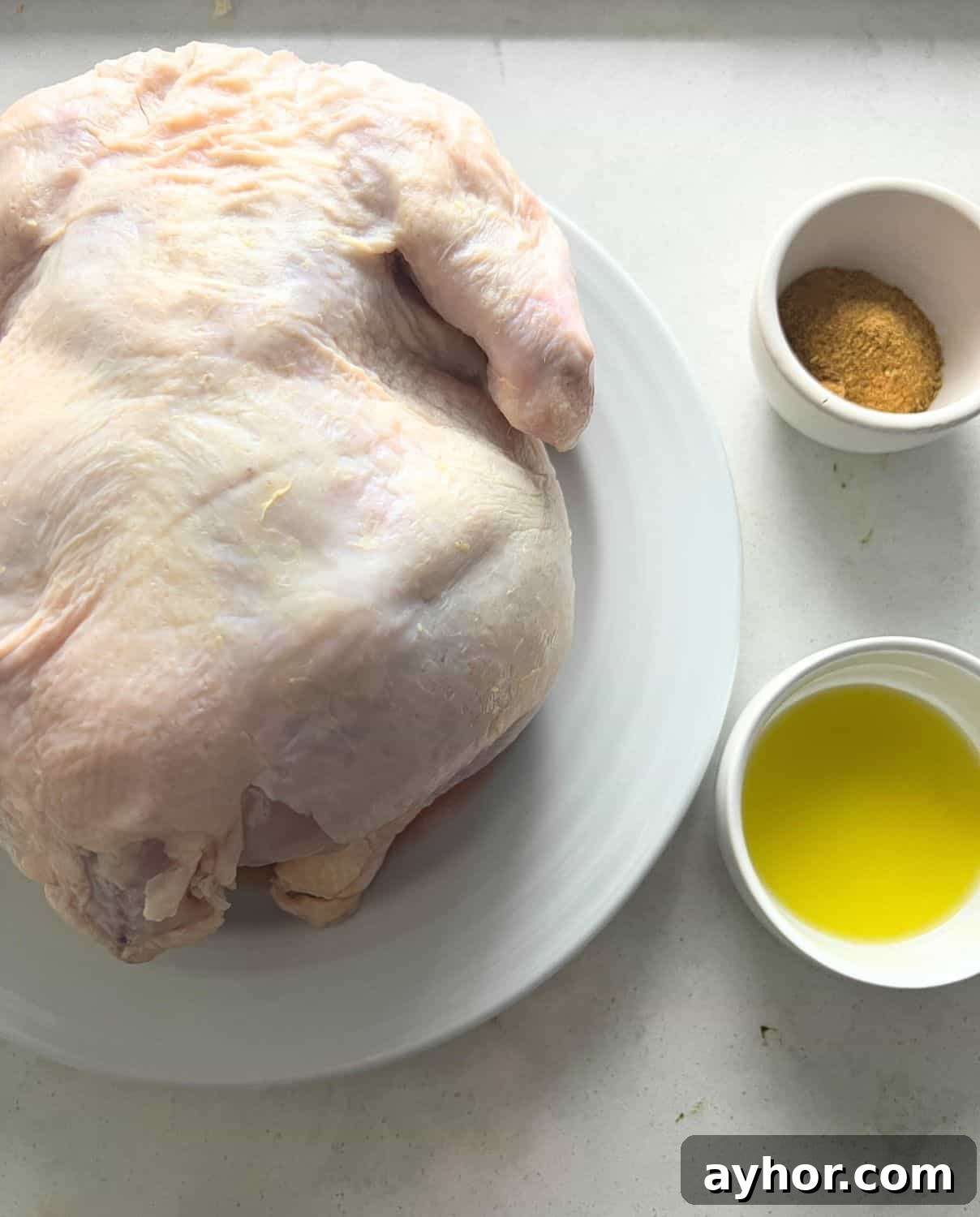 Crispy Whole Chicken in the Air Fryer: Step-by-Step Recipe 3 Ingredients needed for air fryer whole chicken.