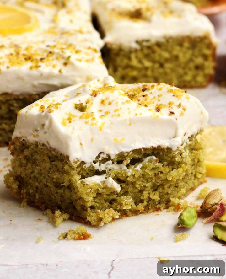 Zesty Lemon Pistachio Cake Recipe with Toasted Nuts 2 slice of lemon pistachio cake