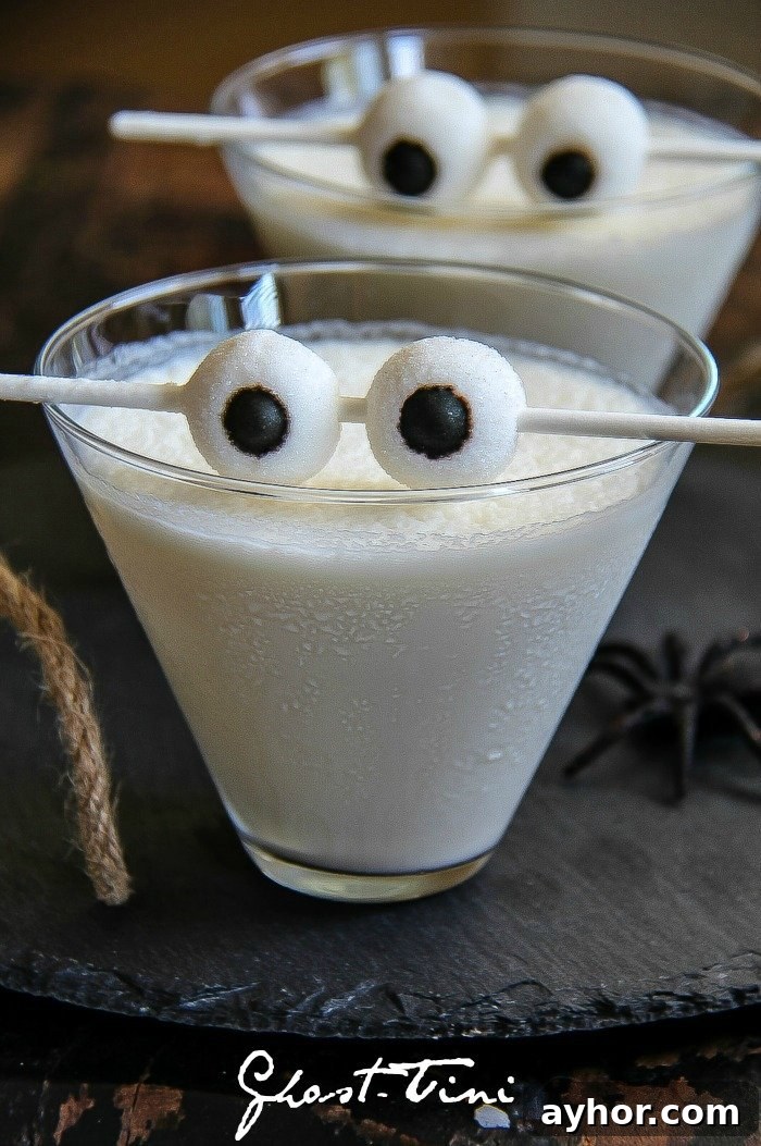 20+ Spooky Halloween Cocktail Recipes for Adults 21 White ghost martini.