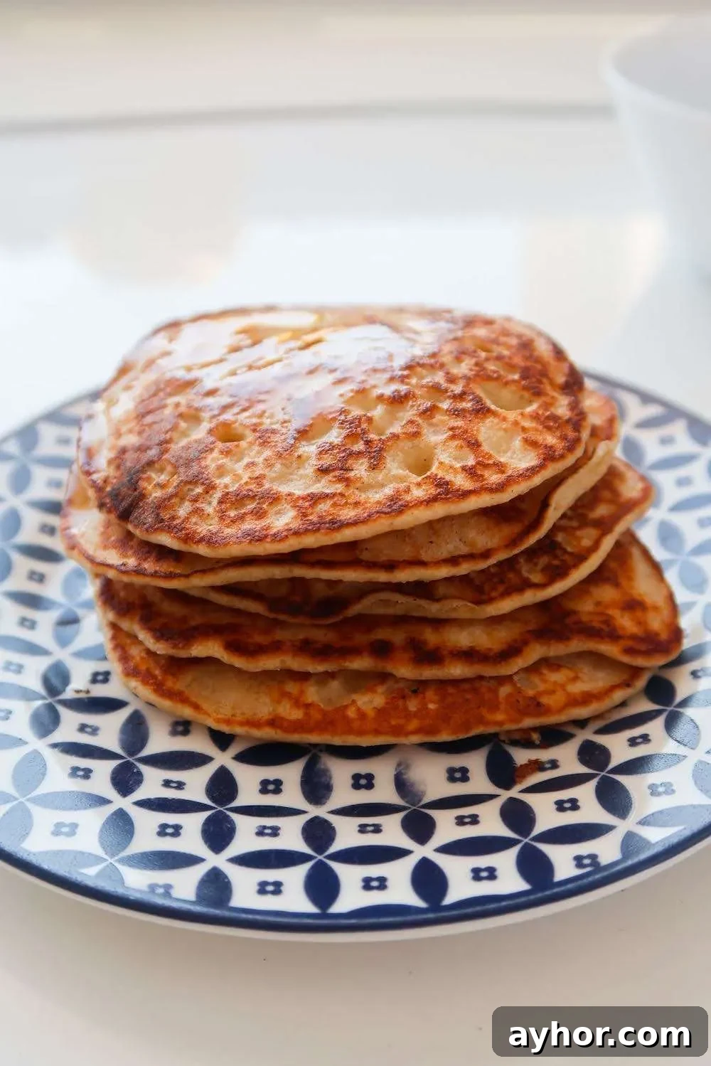 Irresistible Oatmeal Pancakes Recipe You’ll Make Again and Again 3 healthy pancakes with butter
