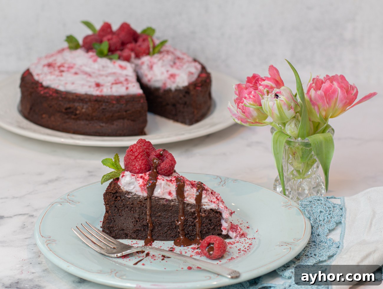 Flourless Chocolate Mousse Cake with Crushed Raspberry Coconut Whipped Cream