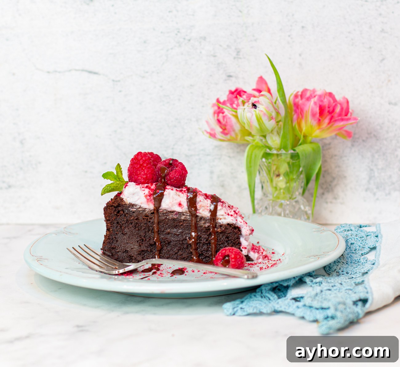 A slice of the cake finished with a Chocolate Hardshell Drizzle
