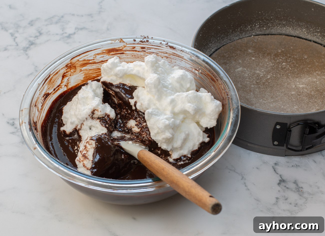 Adding whipped egg whites to chocolate