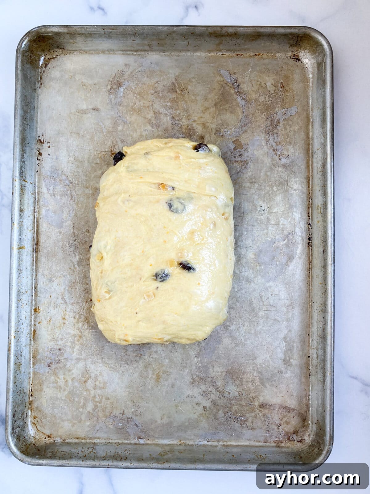 Classic Italian Panettone Recipe: Authentic Holiday Sweet Bread 15 Process for making panettone: folding the dough.