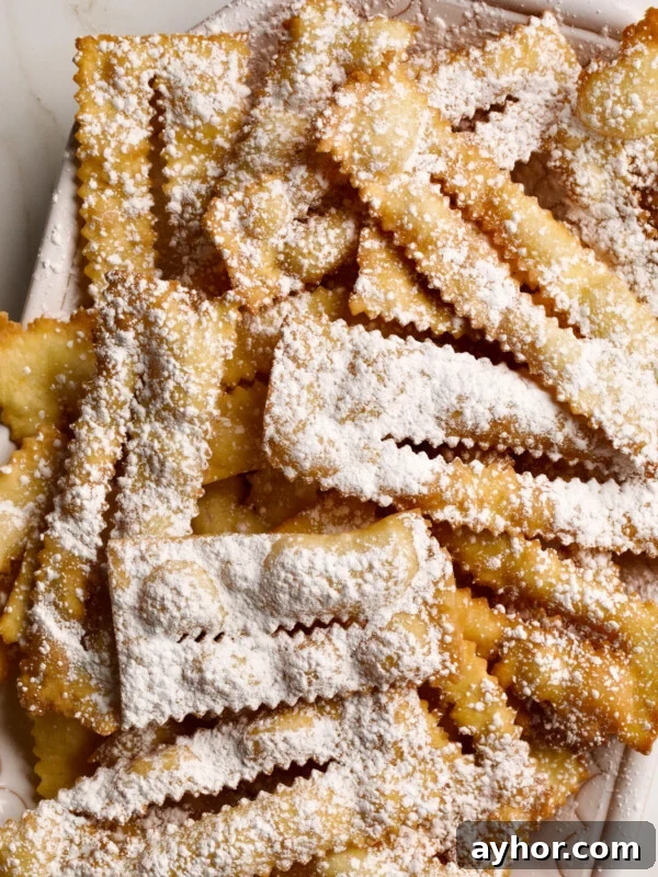 Classic Italian Panettone Recipe: Authentic Holiday Sweet Bread 25 Large tray of chiacchiere di carnevale.