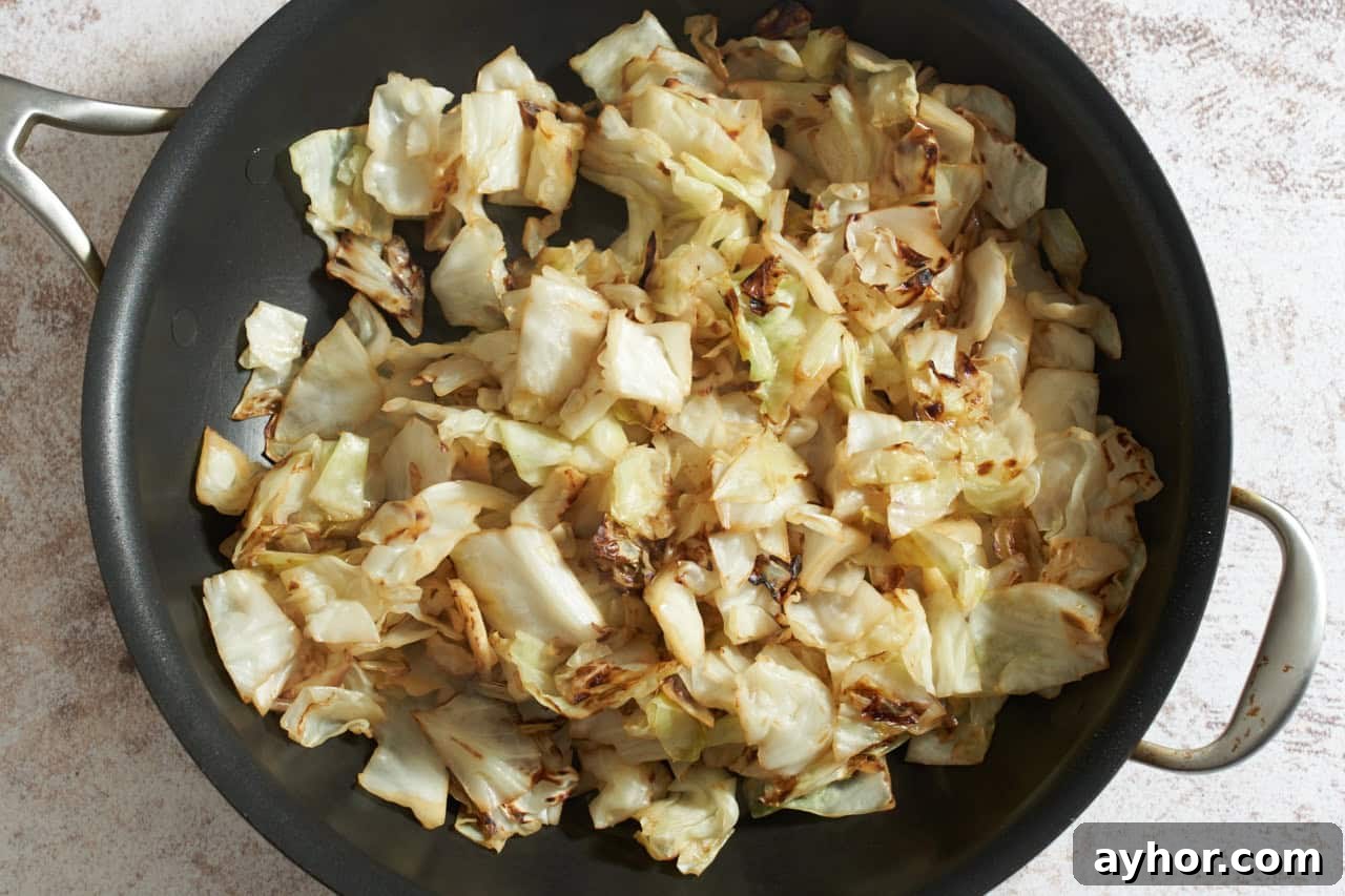 Charred cabbage in a skillet.