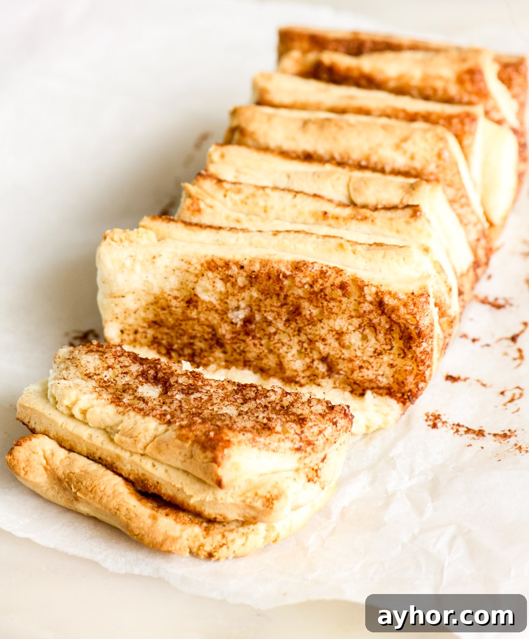 An easy, soft pull-apart mini loaf of bread with cinnamon sugar filling