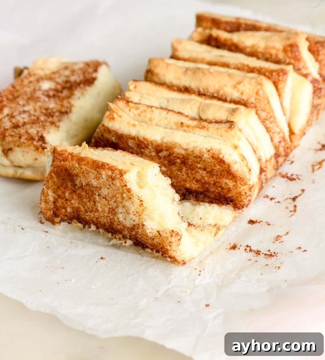 An easy, soft pull-apart mini loaf of bread with cinnamon sugar filling