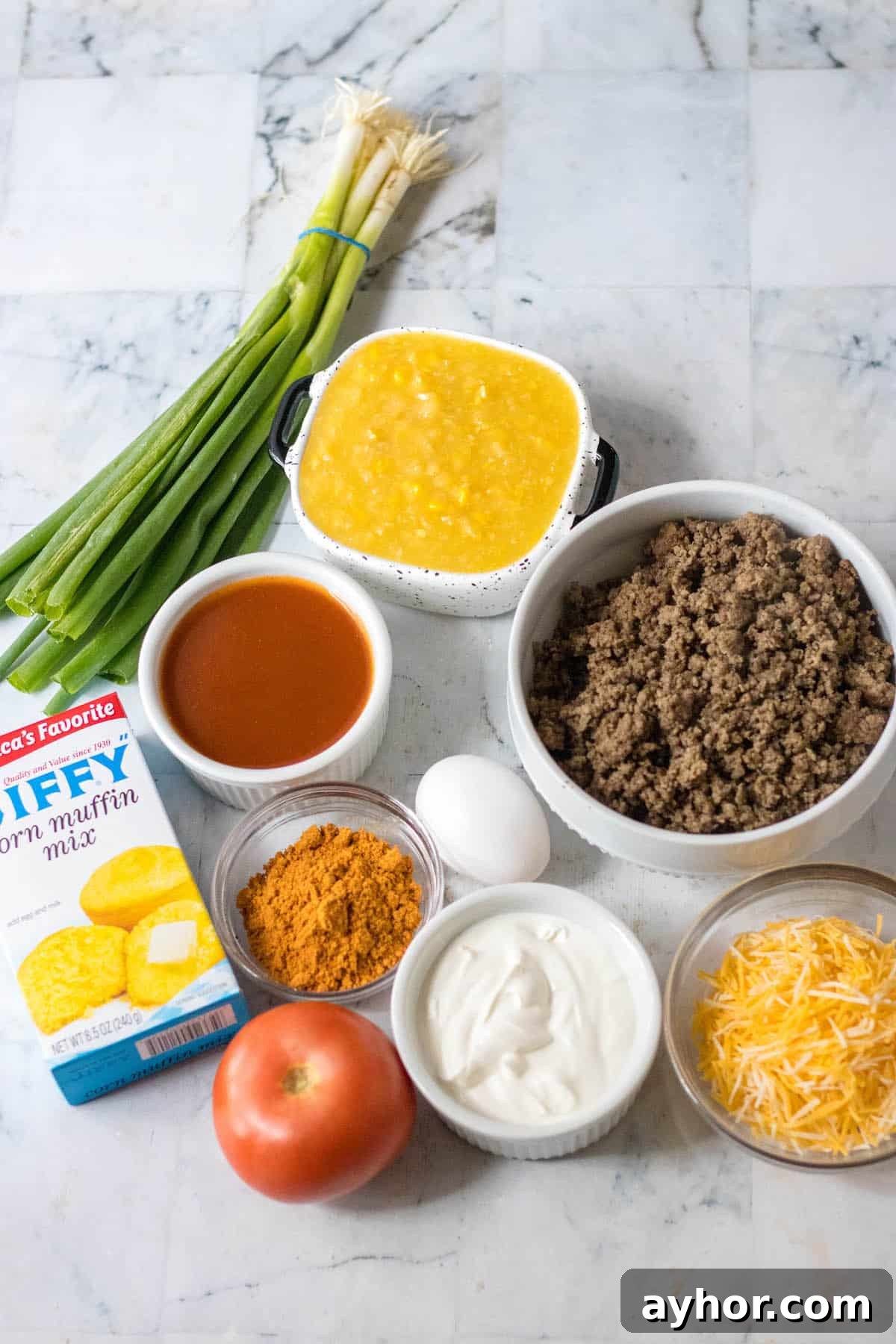 Ingredients measured out to make a cornbread cowboy casserole.