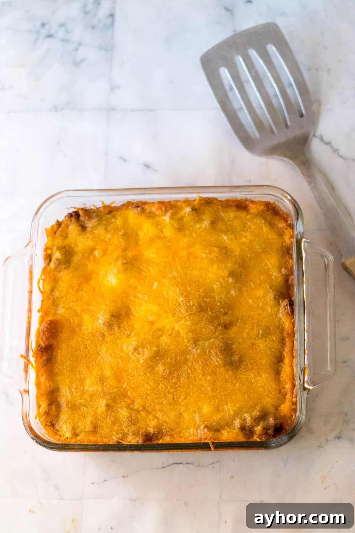 Cheese topped cornbread cowboy casserole.