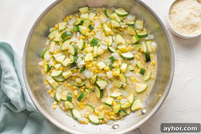 Sauteed zucchini and corn in a light white wine butter sauce.