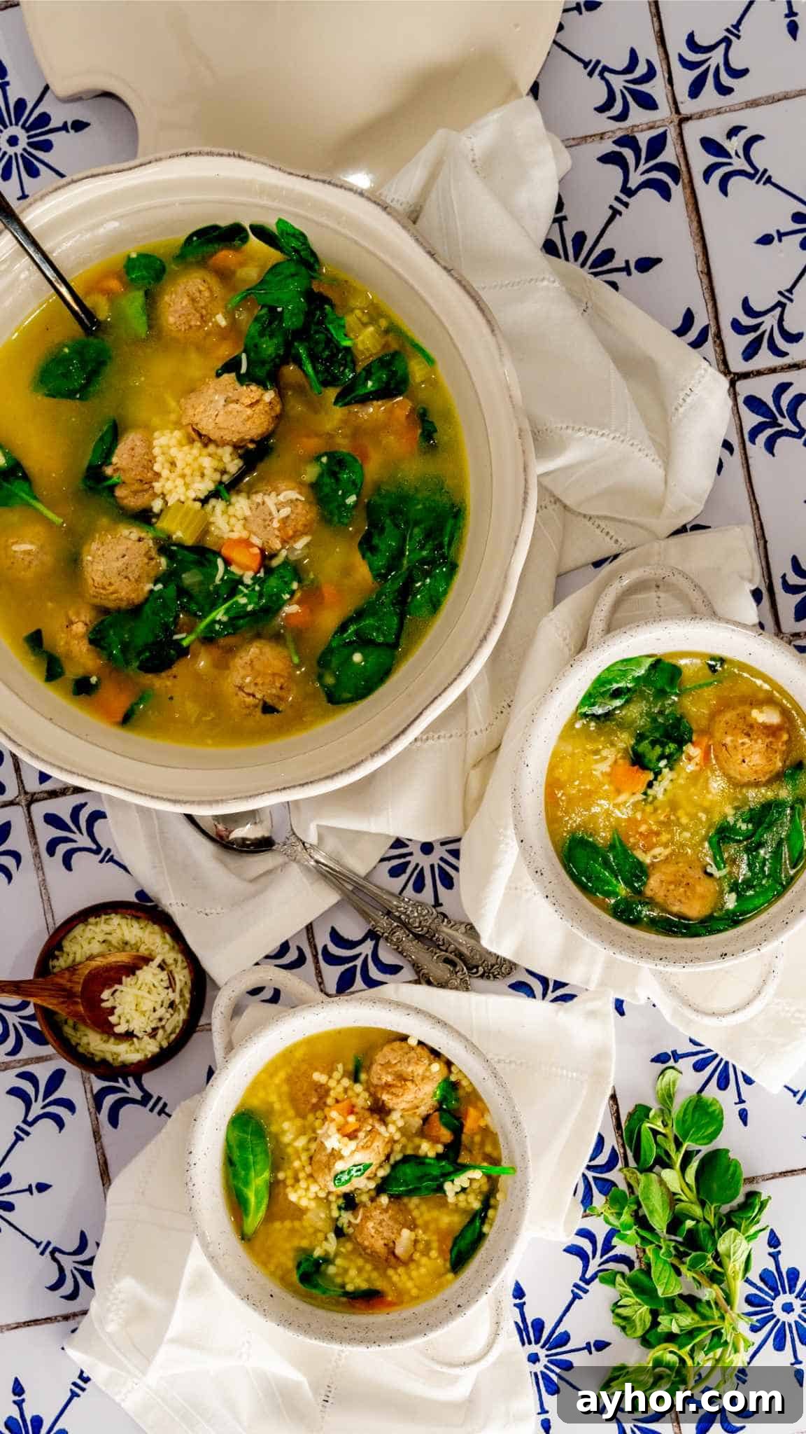 Instant Pot Italian Wedding Soup Recipe — Quick Family-Style Meal 3 Birdsye view of bowls of Instant Pot Italian Wedding Soup on blue and white tile background.