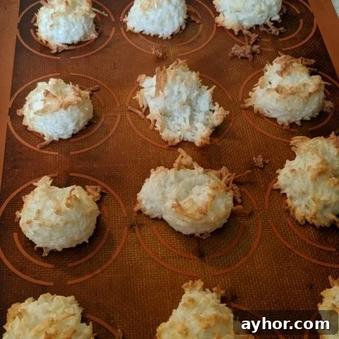 Low-Calorie Coconut Macaroons Recipe for Light Decadence 4 Cooking low calorie coconut macaroons on a cookie sheet