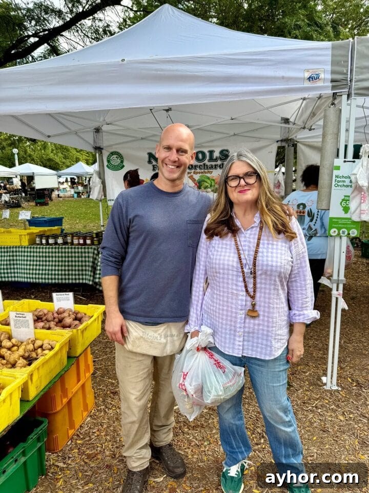 Gluten-Free Apple Crumble Recipe: Crispy Topping, Tender Apples 3 a photo of teri and farmer steve at the farmer's market