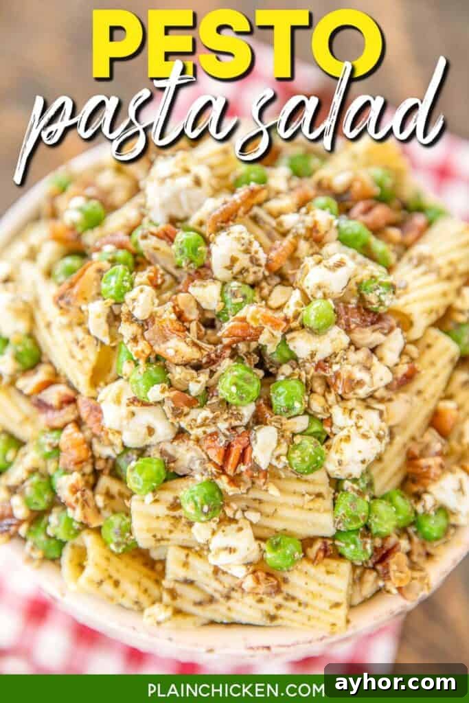 bowl of pasta salad with peas and pesto with text overlay