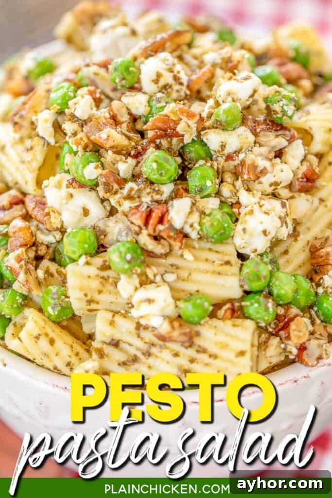 bowl of pasta salad with peas and pesto with text overlay