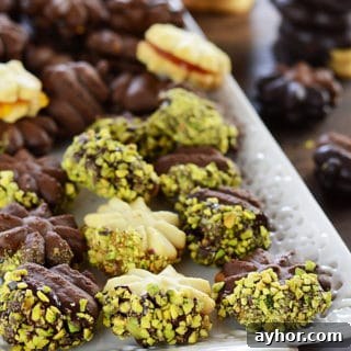 A close up of betefour dessert cookies on a plate