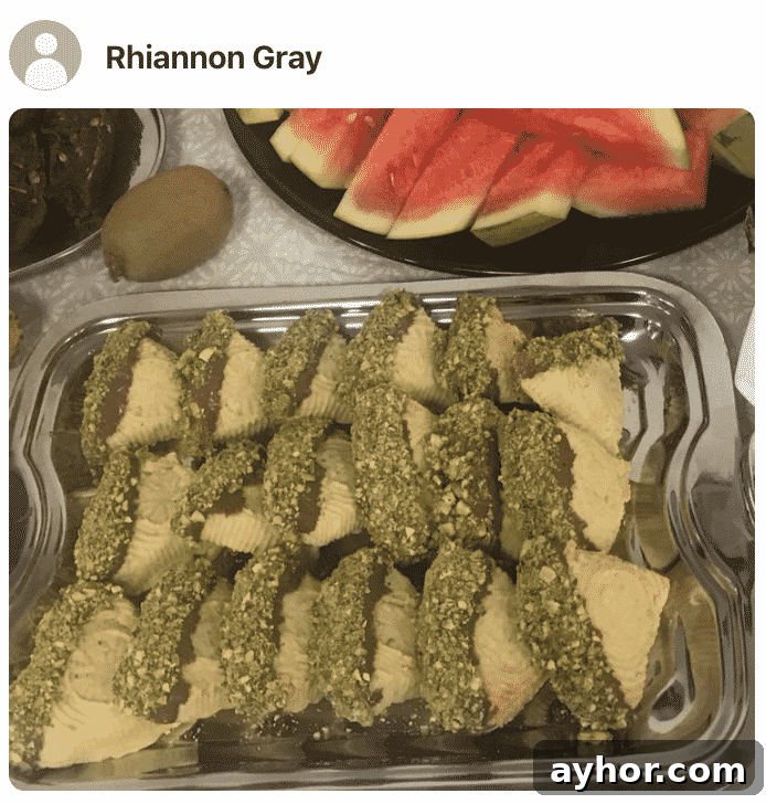 A pan filled with cookies made by a fan