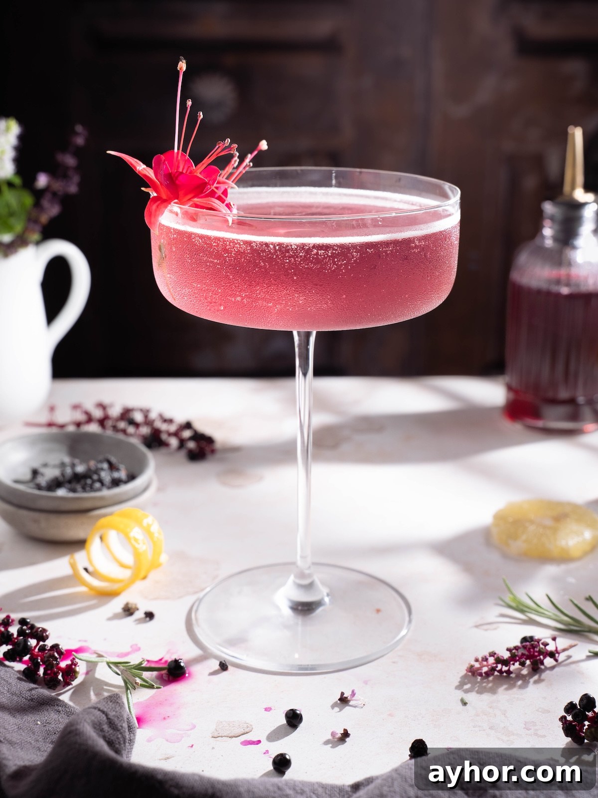 An elderberry drink made with vodka and elderberry simple syrup