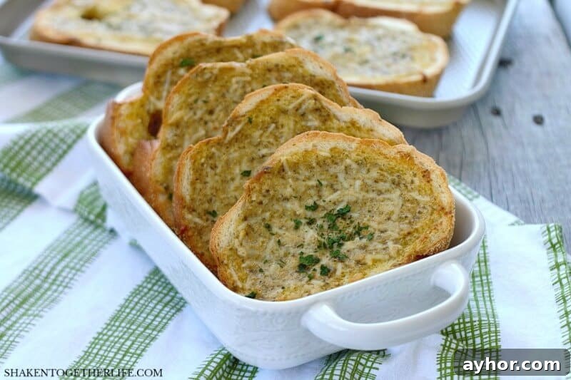 27 Perfect Side Dishes to Serve with Chicken Piccata 6 Homemade Pesto Parmesan Garlic Bread in white dish