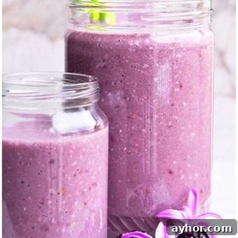 Creamy Blackberry Smoothie Recipe for Breakfast or Snacks 7 Easy Blackberry Smoothie in Glass Jars With Marble Background.