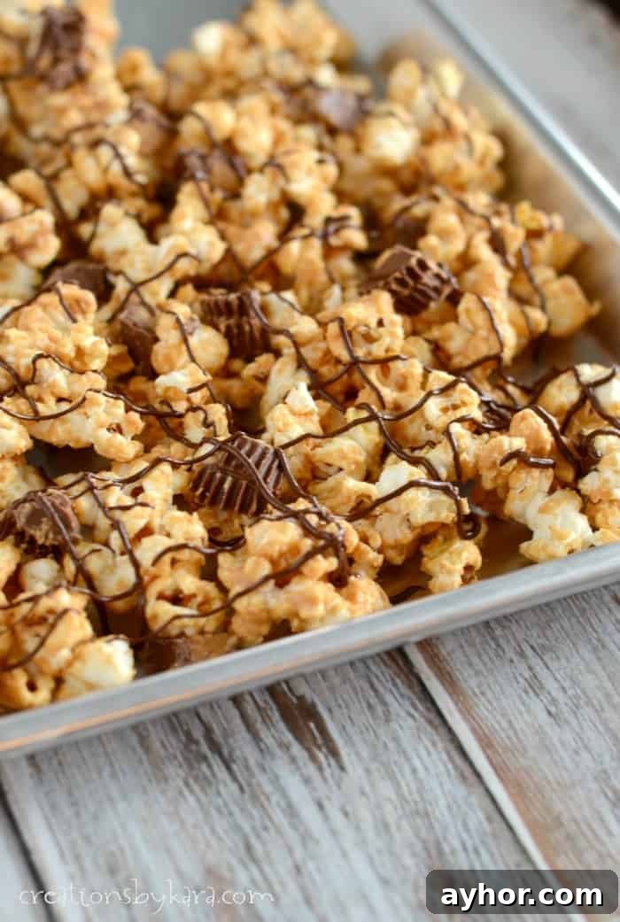 pan of popcorn with peanut butter and reeses