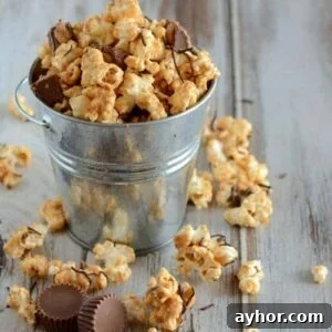 This Reese's Peanut Butter Cup Popcorn is easy to make and such a yummy snack.
